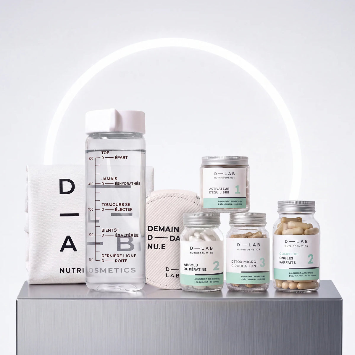 Routine Découverte Cheveux D-LAB : Activateur d'Équilibre, Absolu de Kératine, Détox Micro-Circulation, Complexe Ongles Parfaits, pilulier 7 jours, gourde en verre et tote-bag